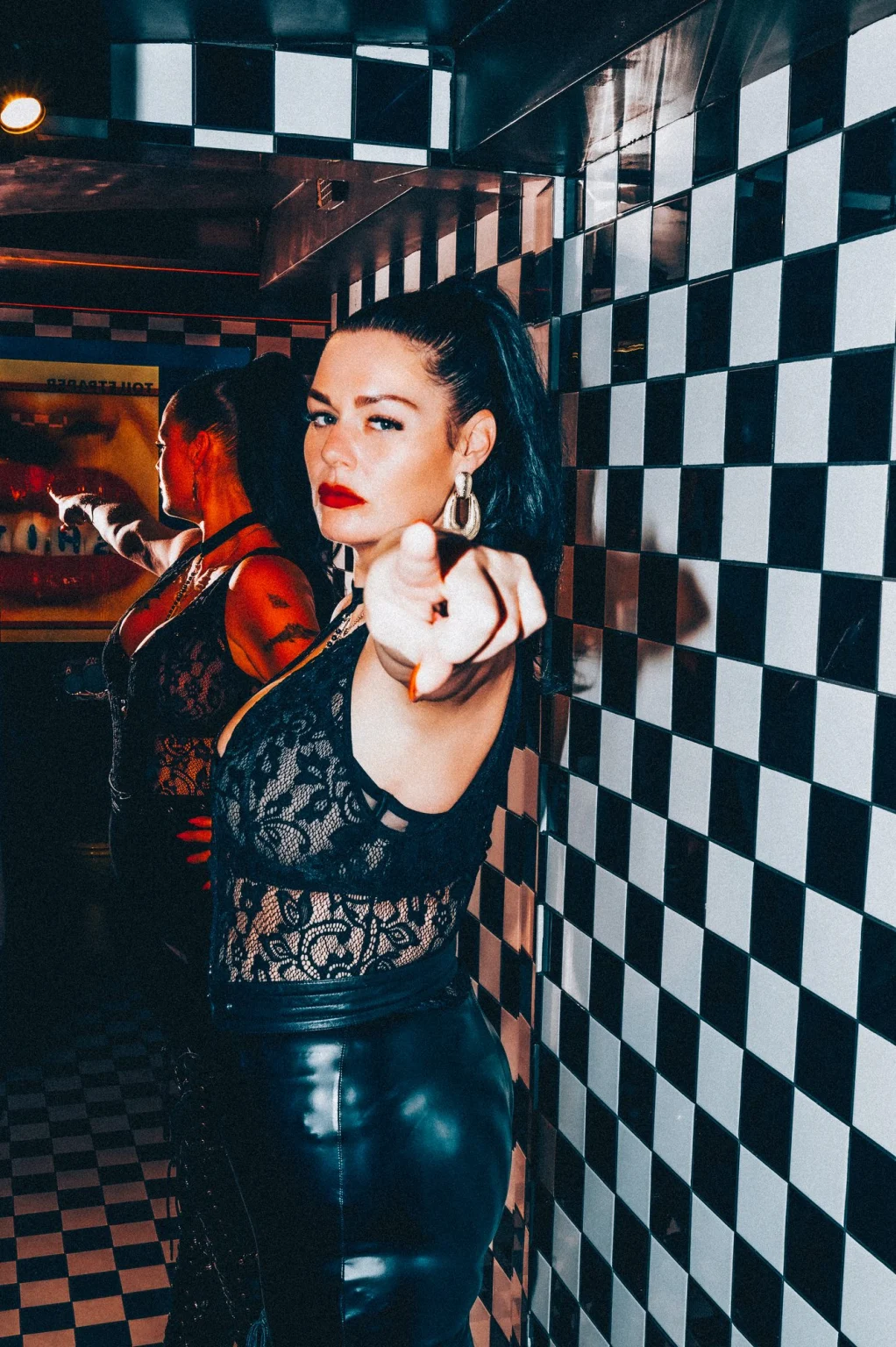 Mistress Charlotte O’Winter pointing in command, strict London mistress