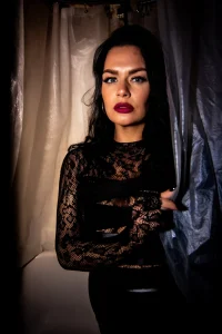 Portrait of Mistress Charlotte O’Winter in black lace, professional dominatrix in London